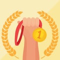 Hand holding golden medal champion prize winner reward Royalty Free Stock Photo