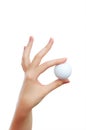 Hand holding golf ball Royalty Free Stock Photo