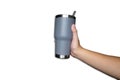 Hand holding gray stainless cup that can use for keeping temperature of drinks Royalty Free Stock Photo