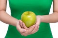 Hand holding green apple isolated over white background. Royalty Free Stock Photo