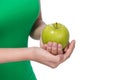 Hand holding green apple isolated over white background. Royalty Free Stock Photo