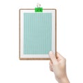 Hand holding green clipboard Royalty Free Stock Photo