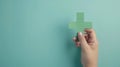 The hand holding green cross.AI generated image Royalty Free Stock Photo