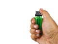 Hand holding green disposable lighter on white background Royalty Free Stock Photo
