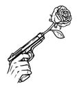 hand holding gun with rose flower Royalty Free Stock Photo