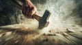 Hand holding a hammer aiming at a nail, depicted with motion blur from an extreme low angle. Royalty Free Stock Photo