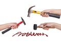 Hand holding hammer beat problems. Royalty Free Stock Photo