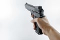 Hand holding a handgun Royalty Free Stock Photo