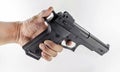 Hand holding a handgun Royalty Free Stock Photo