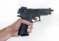 Hand holding a handgun Royalty Free Stock Photo