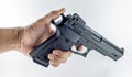 Hand holding a handgun Royalty Free Stock Photo