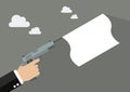 Hand holding handgun with a white flag Royalty Free Stock Photo