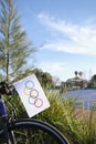 Homemade olympic flag made of paper put on the front of a bicycle