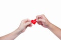 Hand holding heart-shaped isolated over white,clipping path