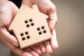 Hand holding home model, happy homes for families Royalty Free Stock Photo