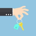 Hand holding a house key Royalty Free Stock Photo