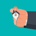 Hand holding house keys. Handing key to home vector