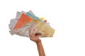 Hand holding huge wad of paper Royalty Free Stock Photo