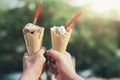 hand holding ice cream cone in morning Royalty Free Stock Photo