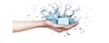 A hand holding an ice cube surrounded by splashes of water creating a refreshing and dynamic visual effect Royalty Free Stock Photo