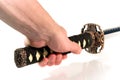 Hand holding a Japanese sword