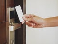 Hand Holding Key card Hotel room access Royalty Free Stock Photo