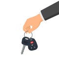 Hand holding a key and a fob. Concept of buying or renting a new car Royalty Free Stock Photo