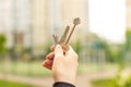 Hand holding keys in front of building Royalty Free Stock Photo