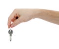 Hand holding keys isolated on a white background Royalty Free Stock Photo