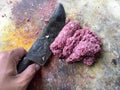 Hand holding knife and minced meat Royalty Free Stock Photo