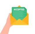 Hand holding a letter with text accepted. Email with accepted header. Confirmation email message.