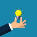 Hand holding light bulb. Business idea concept. Vector Royalty Free Stock Photo