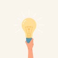 Hand holding Light Bulb. Flat illustration of a glowing light bulb Royalty Free Stock Photo