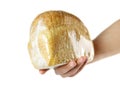 Hand holding a loaf of sliced bread. Close up. Isolated on white background Royalty Free Stock Photo