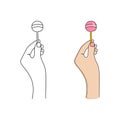 Hand holding lollipop. Chupachups candy