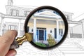 Hand Holding Magnifying Glass Revealing Finished House Build Over Drawing Royalty Free Stock Photo