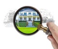 Hand Holding Magnifying Glass Reveals Finished House Build Over Drawing