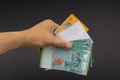 Hand holding Malaysia Ringgit MYR Currency Bank Notes. Royalty Free Stock Photo