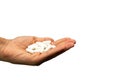 Hand holding pills isolated on white background Royalty Free Stock Photo