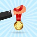 Hand holding medal. Competition winner design concept Royalty Free Stock Photo