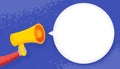 Hand holding megaphone with blank speech bubble. Loudspeaker advertisement concept. Banner for business, promotion and advertising Royalty Free Stock Photo