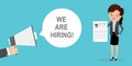 Hand holding megaphone and speech bubble with we are hiring text