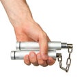 Hand holding a metal nunchaku