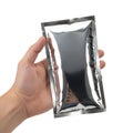 A hand holding a metallic-framed rectangular mirror with a reflective surface Royalty Free Stock Photo