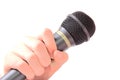 Hand holding microphone Royalty Free Stock Photo