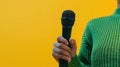 The microphone held by hand.AI generated image Royalty Free Stock Photo