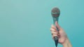 A Hand Holding a Microphone.AI generated image Royalty Free Stock Photo