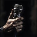 Hand holding microphone, concert, live, voice, sound, communication Royalty Free Stock Photo