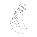 Hand holding the microphone. Continuous linear drawing wired dynamic microphone. Minimalistic linear design. Black line art.
