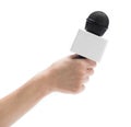 Hand holding microphone for interview Royalty Free Stock Photo